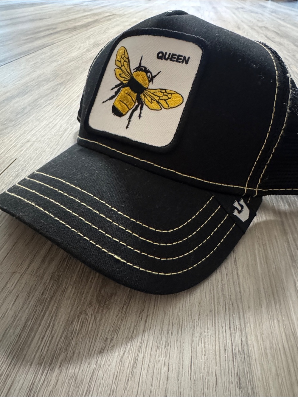Goorin Bros Black Trucker Cap with Yellow Bee Patch